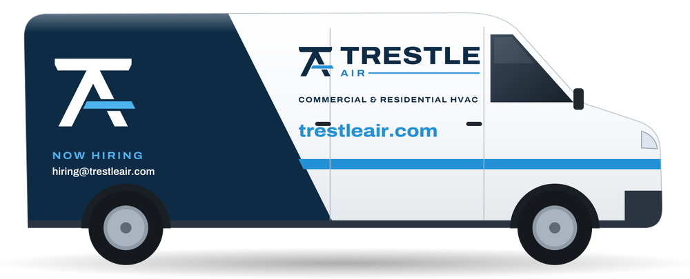 Side view of a white Trestle Air service van with a navy rear panel, the TA mark, the Trestle Air logo, trestleair.com and a blue stripe along the side